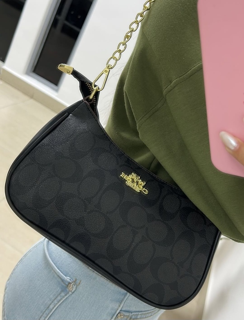 Cartera Coach para mujer.
