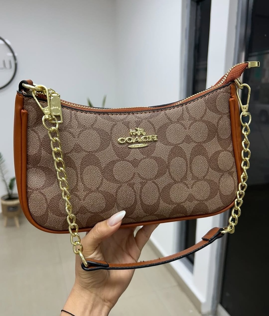 Cartera Coach para mujer.