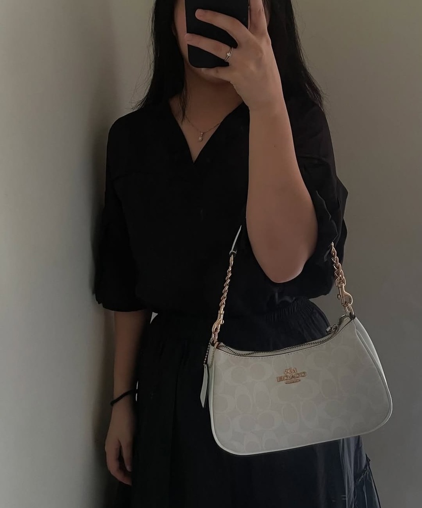 Cartera Coach para mujer.