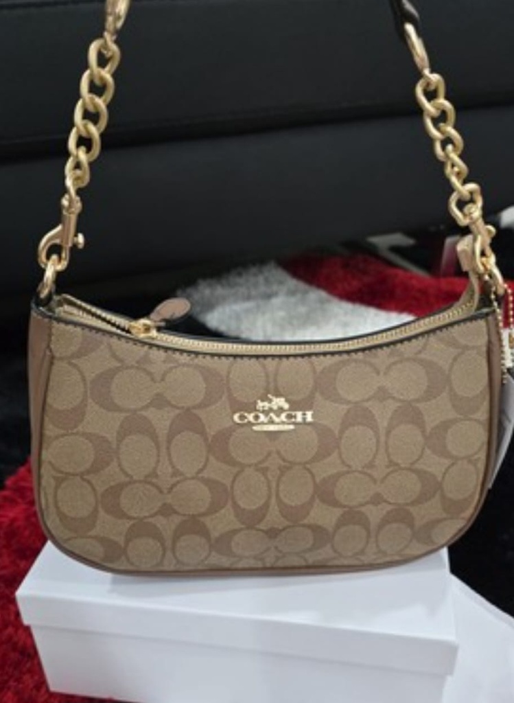 Cartera Coach para mujer.